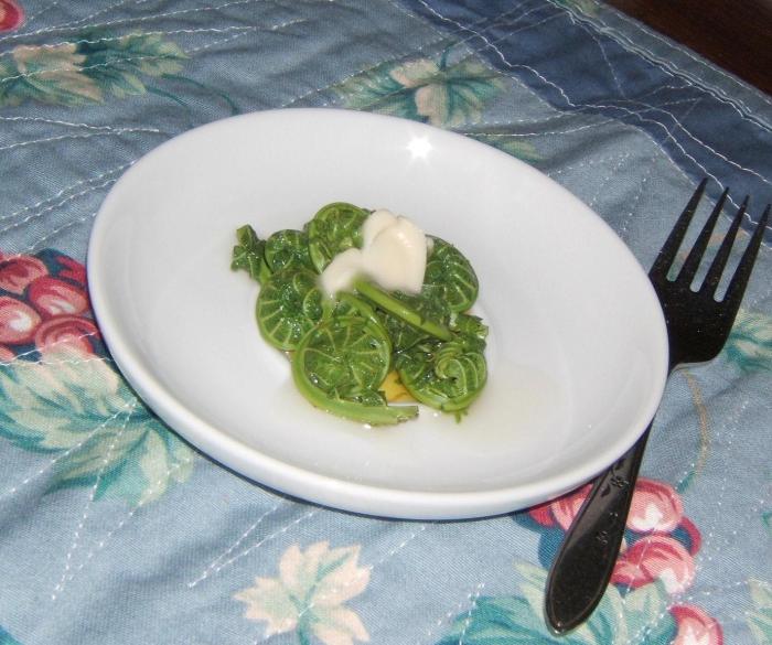 cooked fiddleheads with margarine