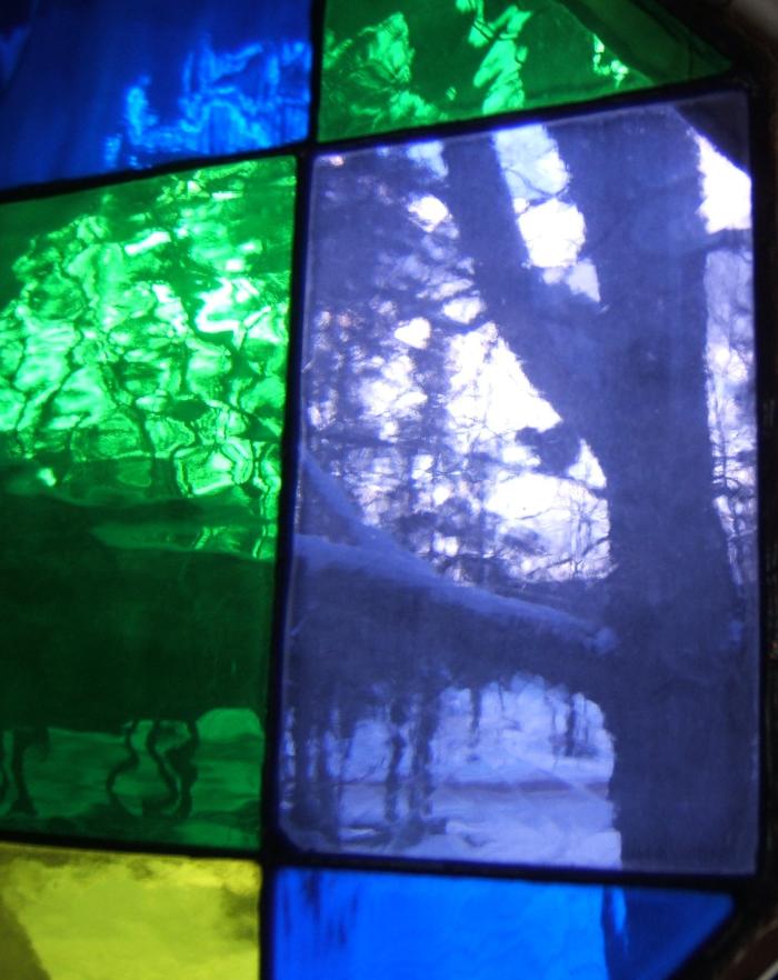 squirrel through stained glass