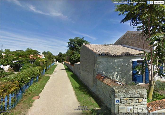 narrow alley in the village (image from Street View)