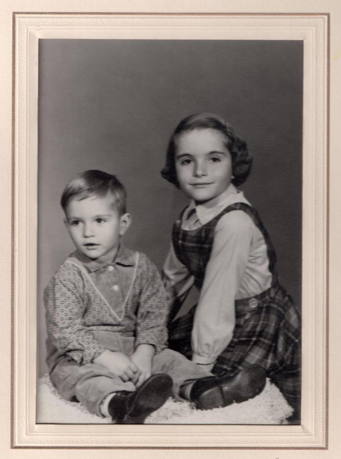 My brother and I in 1960 - I had been in Grade One for three months when the picture was taken - I look like I could easily make those seven blocks to school!