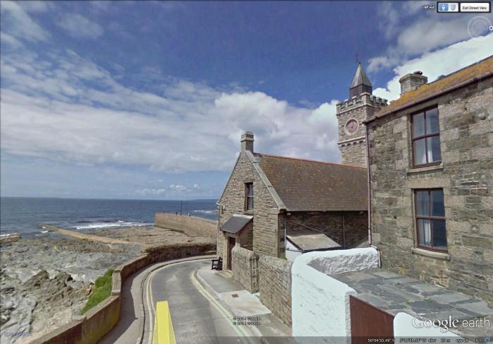 seawall and clock tower at Porthleven (image from Street View)